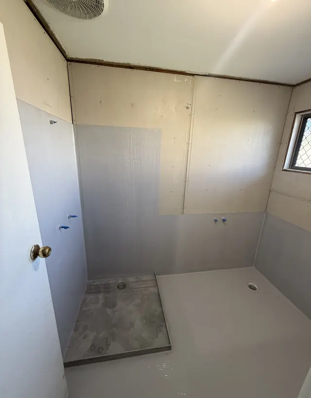Bathroom walls and floor membraned, ready for the tiler